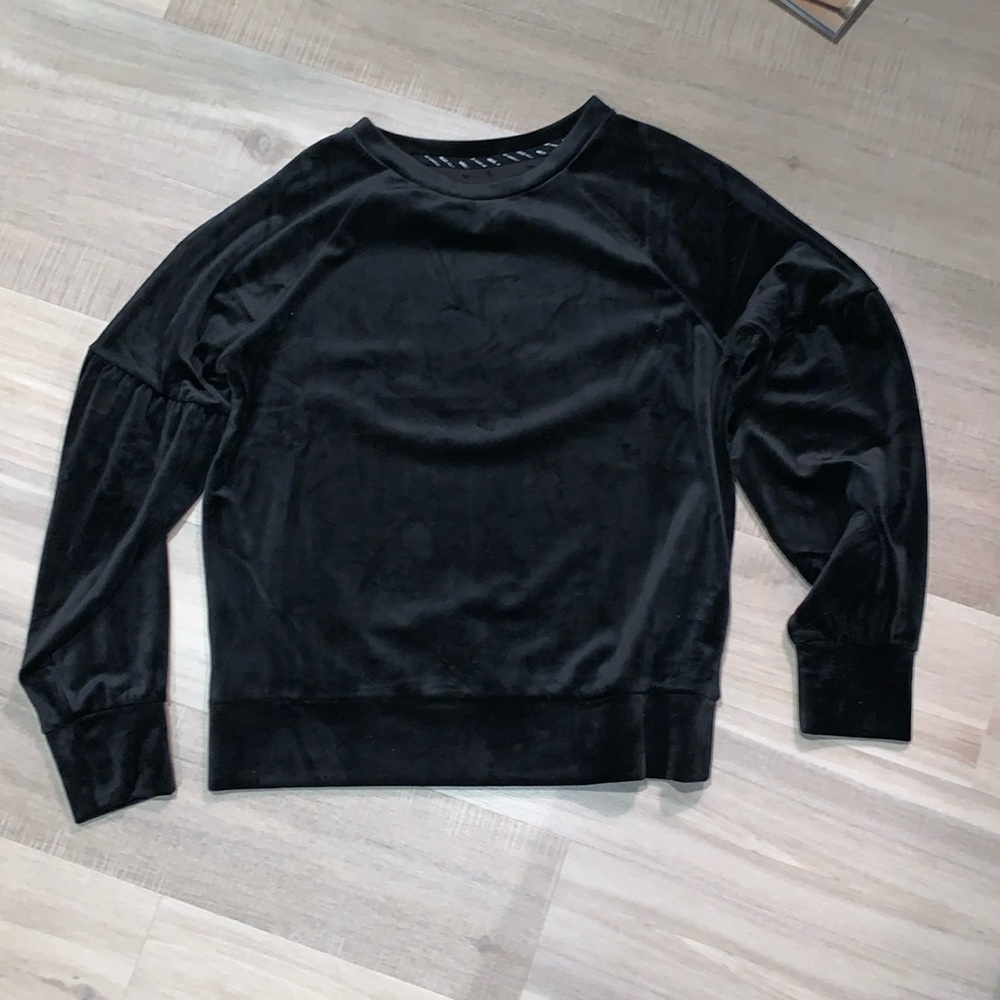 Black Velvet sweatshirt with puffy sleeves and banded at wrist and waist.